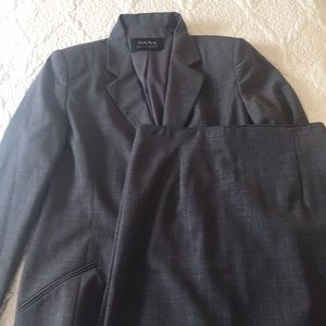 Dana Buchanan grey suit with slit on skirt